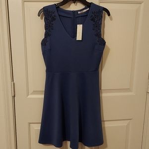 Dress with floral accent designs